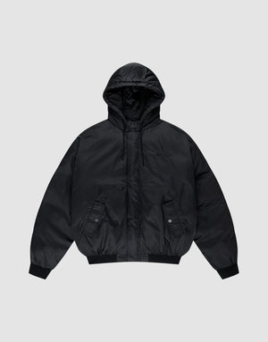 The LFDY Winter Bomber Jacket by LIVE FAST DIE YOUNG is a black oversized puffer with a hood and drawstrings, front snap-button pockets, ribbed cuffs, and hem, shown on a light gray background. | plain