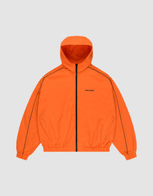 The LIVE FAST DIE YOUNG Live Fast Trackjacket is bright orange with a black zipper, zippered pockets, black sleeve piping, elastic cuffs and hem, and a subtle left chest logo. Displayed against a plain light gray background. | plain