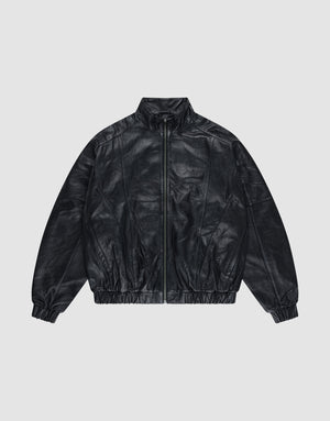 The Live Fast Leather Trackjacket by LIVE FAST DIE YOUNG is a black, zip-up, long-sleeve jacket with an embossed logo, Stehkragen, and elastic cuffs and waistband, shown on a plain light gray background. | plain