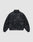 The Live Fast Leather Trackjacket by LIVE FAST DIE YOUNG is a black, zip-up, long-sleeve jacket with an embossed logo, Stehkragen, and elastic cuffs and waistband, shown on a plain light gray background.
