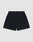 LIVE FAST DIE YOUNG Basic Mesh Shorts in black feature a regular fit, lightweight polyester fabric, elastic waistband, and single rectangular back pocket. Shown on a plain light gray background.