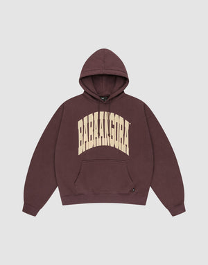 The LFDY x Baba Angora Hoodie by LIVE FAST DIE YOUNG is a maroon oversized cotton pullover with "BABAANGORA" in bold, arched beige letters on the chest. It has a front pocket and is shown flat on a light gray background. | plain