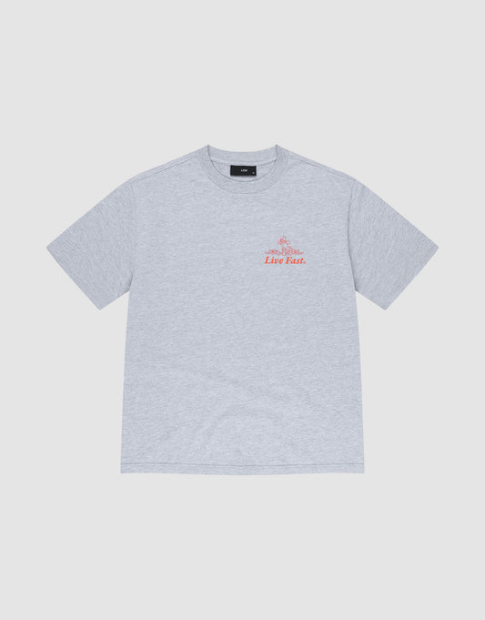 The LFDY Praying Tee by LIVE FAST DIE YOUNG is a light gray, oversized Baumwolle short-sleeve t-shirt featuring a small red "Live Fast" text and graphic on the upper left chest, displayed on a white background.