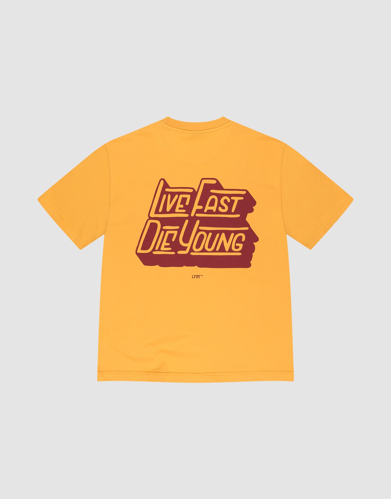 The LFDY Tube Pocket Tee by LIVE FAST DIE YOUNG is a yellow oversized t-shirt with bold maroon "Live Fast Die Young" text in retro font on the back, crafted from 100% Baumwolle and set against a plain light gray background. | plain
