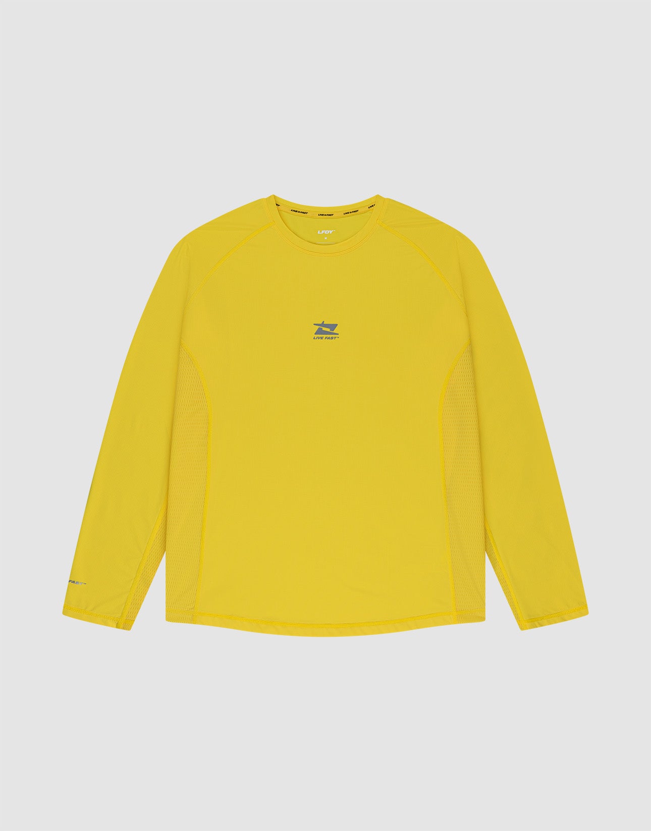 The LIVE FAST DIE YOUNG Live Fast Performance Longsleeve is a bright yellow, slim-fit athletic shirt with a small blue logo and chest text, mesh-like panels and side inserts for breathability, and a crew neckline on a light gray background.