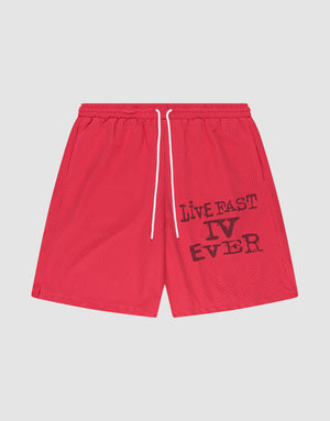 The LIVE FAST DIE YOUNG Live Fast IV Ever Shorts are red mesh athletic shorts with an elastic waistband, white drawstring, and "LIVE FAST IV EVER" printed in black on the left leg, shown on a plain white background. | plain