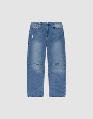 The LIVE FAST DIE YOUNG Oversize Ripped Denim jeans feature a light blue wash, straight-leg fit, distressed details with a rip above one pocket, faded knee patches, five pockets, a button fly, and classic Gerades Bein style. | plain