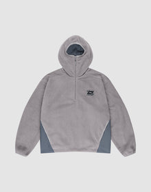 The Live Fast Fleece Halfzip by LIVE FAST DIE YOUNG is a light grey polyester fleece hoodie with an oversized fit, half-zip, long sleeves, small black left chest logo, and darker grey nylon einsatz panels on the lower sides. Plain white background. | plain