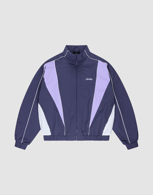 The LIVE FAST DIE YOUNG Basic Nylon Trackjacket features a navy blue and lavender Regular Fit with white accents, a zip-up front, high collar, Logo-Stick detail, and elastic cuffs and hem, shown on a light gray background. | plain