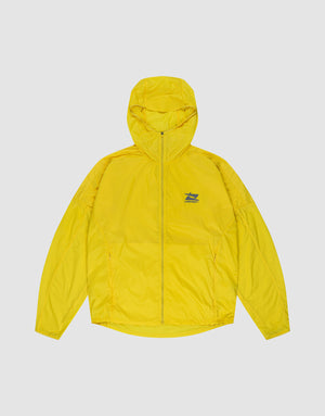 The Live Fast Performance Running Jacket by LIVE FAST DIE YOUNG is a bright yellow, regular fit hooded windbreaker with a front zipper, long sleeves, lightweight material, green chest logo, and reflective front print on a white background. | plain