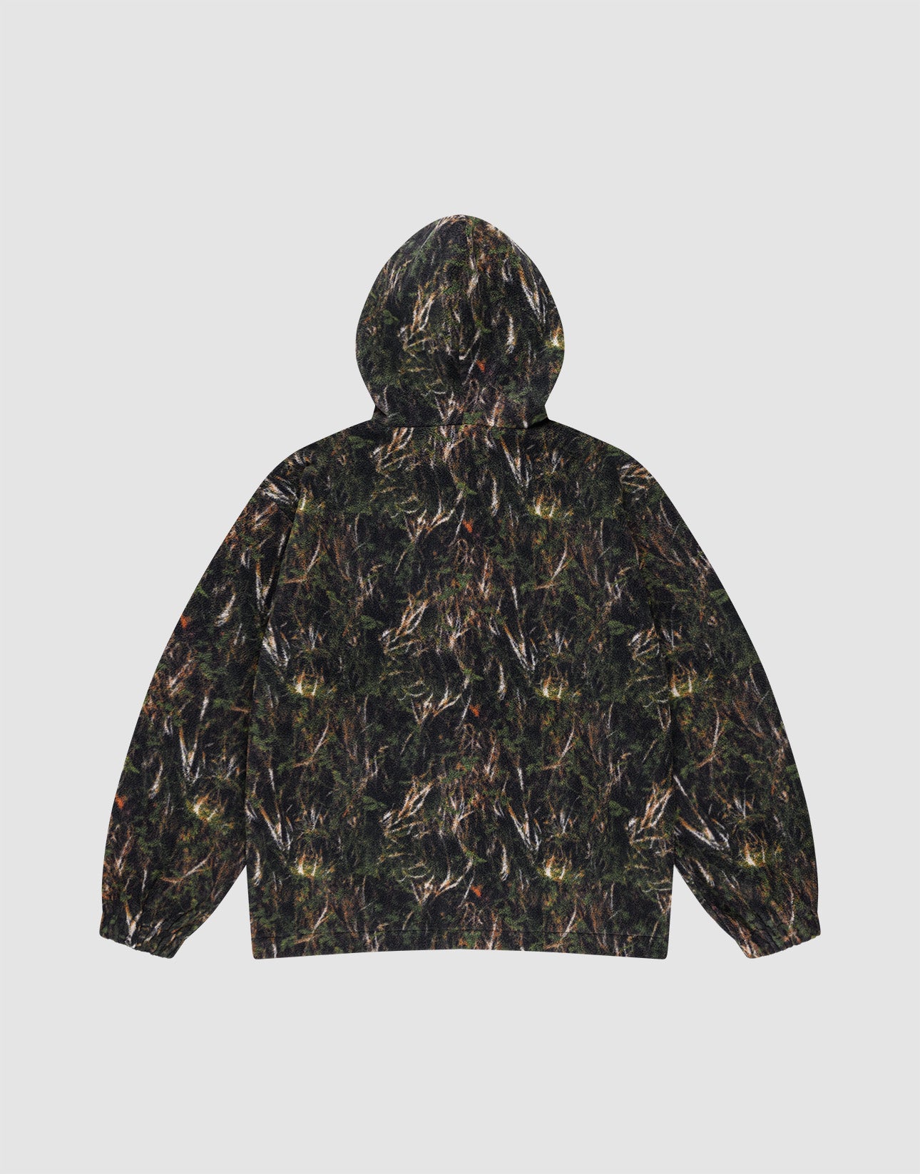 The LIVE FAST DIE YOUNG LFDY Fleece Hooded Zip is shown from the back, featuring an oversize fit and all-over dark green, brown, and black camouflage. The hoodie includes a drawstring hood for added comfort.