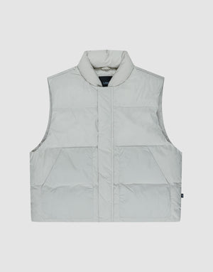 The LIVE FAST DIE YOUNG Basic Cropped Vest is a light grey, sleeveless polyester puffer with a high collar, two large front pockets, and a regular fit. Shown on a plain white background, it's perfect for versatile layering. | plain