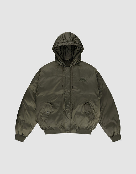 The LFDY Winter Bomber Jacket by LIVE FAST DIE YOUNG features an olive green oversize fit, hood with drawstrings, front snap pockets, ribbed cuffs and hem, and a subtle chest logo stick, shown on a plain light gray background. | plain