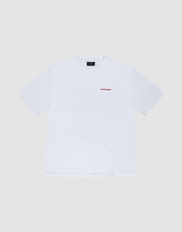 The LFDY Cinema Tee by LIVE FAST DIE YOUNG is an oversized white short-sleeve shirt made from 100% Baumwolle, featuring small red 'LIVE FAST' text on the left chest, shown against a light gray background.