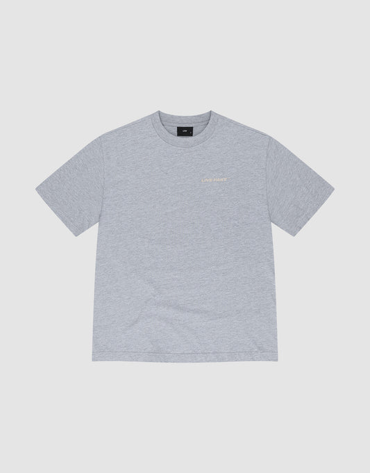 The LFDY Hardwear Tee by LIVE FAST DIE YOUNG is a soft light gray short-sleeved Baumwolle shirt with a small white or light "LIVE FAST" Pufferprint on the left chest, shown flat on a white background.