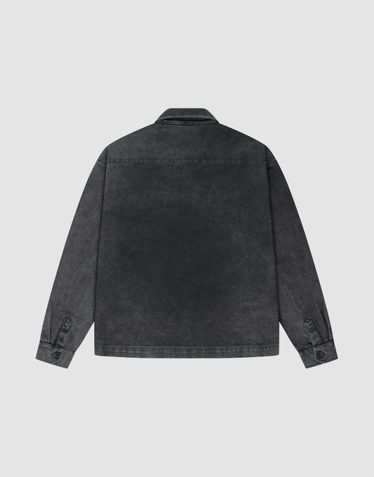 Back view of the LIVE FAST DIE YOUNG Vintage Dyed Flannel in charcoal gray, featuring an oversize fit, long sleeves with button cuffs, collar, and simple stitching. Made from 100% Baumwolle with a subtle vintage finish, shown on a light background.