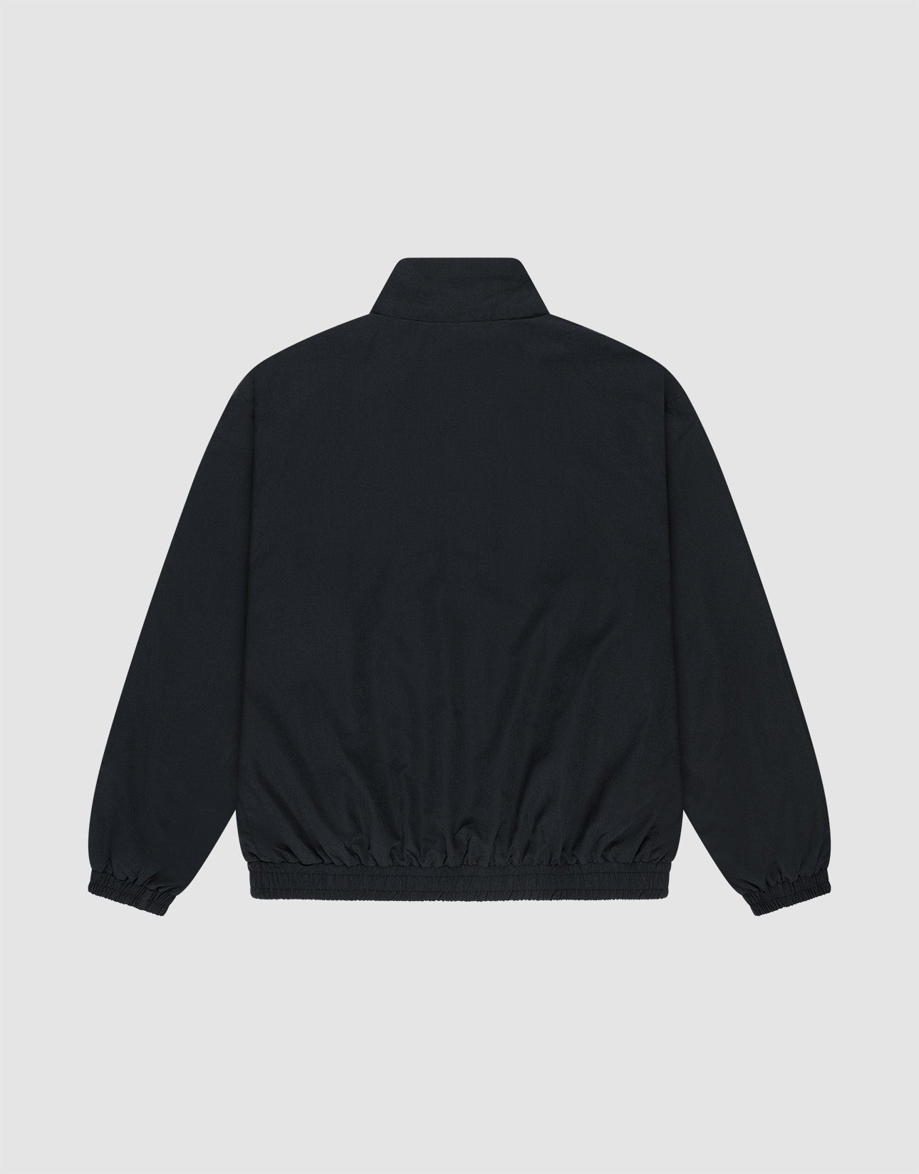 The LFDY Trackjacket by LIVE FAST DIE YOUNG is an oversized black polyester jacket with a stand-up collar, elasticized cuffs, and waistband, shown from the back against a light gray background.