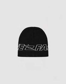 The Live Fast Jacquard Beanie by LIVE FAST DIE YOUNG is a black Polyacryl beanie with white FAST text and a subtle Logo Strick Outline, shown on a plain light gray background. Model: LF2410-16283.