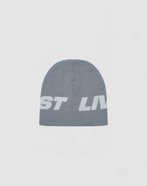 The Live Fast Jacquard Beanie by LIVE FAST DIE YOUNG is a gray Polyacryl knit beanie with a bold white ST LIV logo. Shown on a light background. Style code: LF2410-16486.