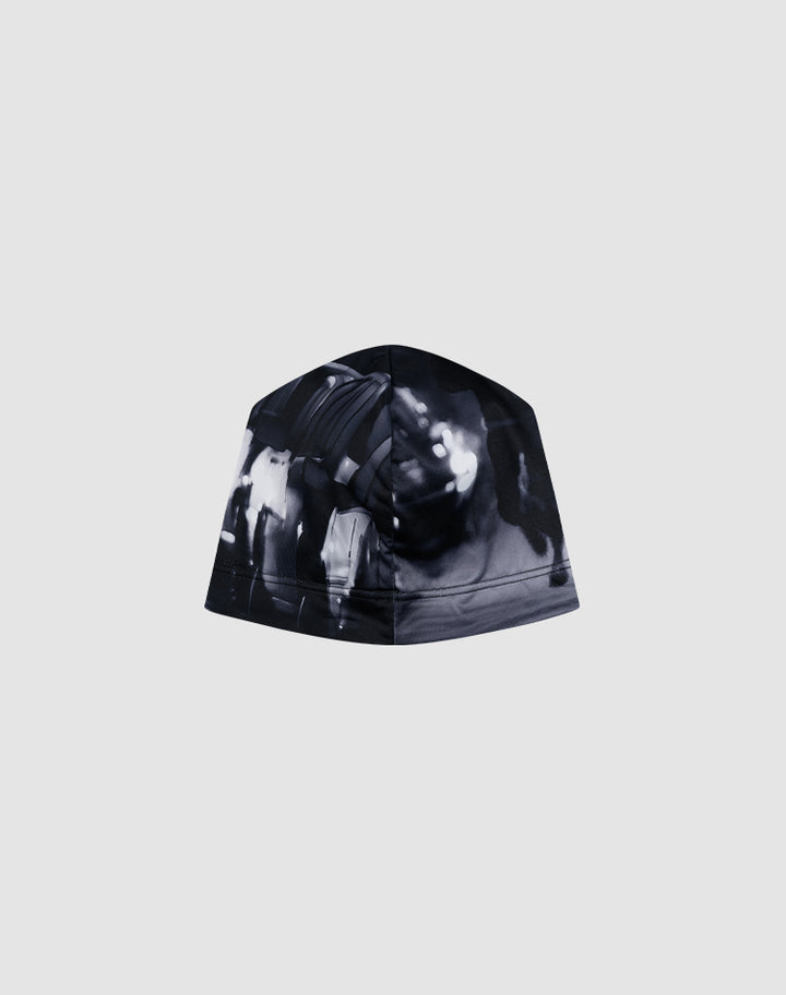 The LIVE FAST DIE YOUNG Live Fast Performance Beanie features a black and white abstract, blurred graphic print on a plain grey background.