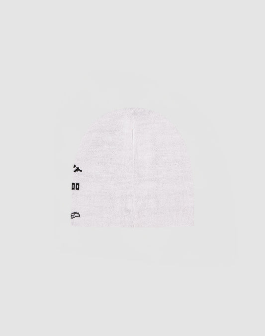 The LFDY Praying Beanie by LIVE FAST DIE YOUNG is a plain white polyacryl knit hat with small black symbols and a logo stick with text on the left side, shown on a light gray background.