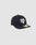 A dark navy LFDY x NEW ERA 59FIFTY Low Profile fitted cap by LIVE FAST DIE YOUNG features a white embroidered front logo and gold brim sticker, displayed on a plain light gray background.
