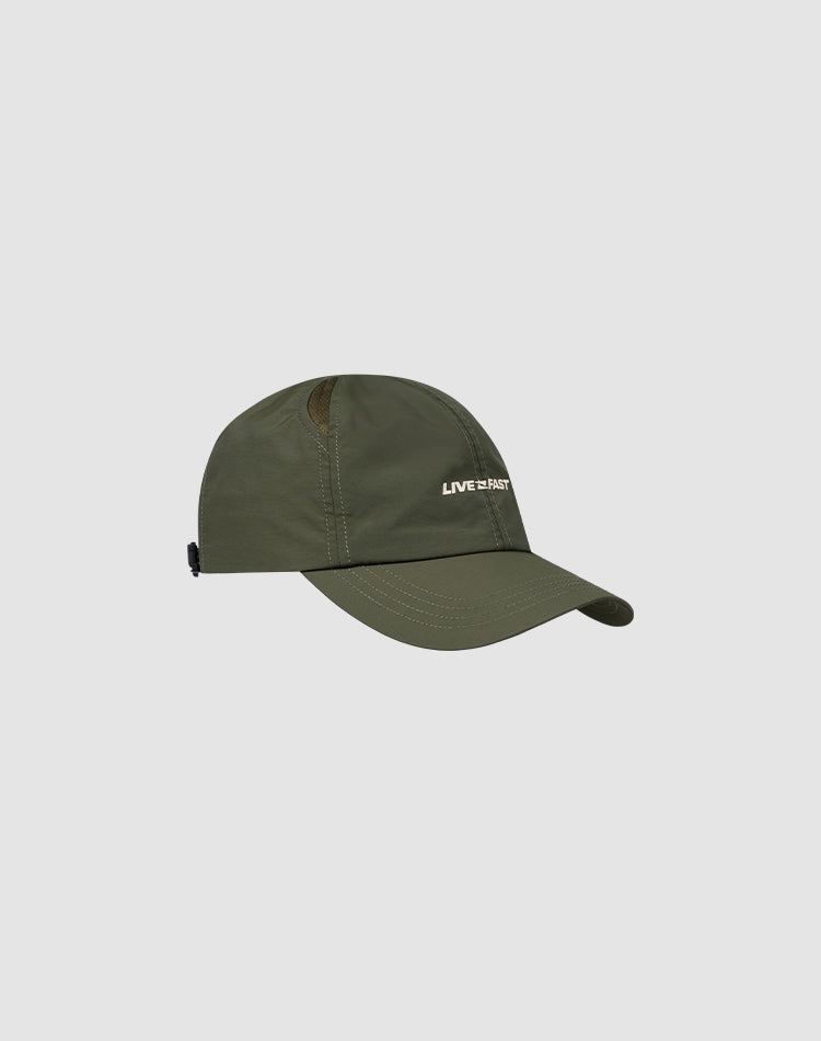 The LFDY Performance Cap by LIVE FAST DIE YOUNG features an olive green color, geometric ventilation holes, visible stitching, and "LIVE2PARTY" embroidered in white on the front, displayed against a light grey background.