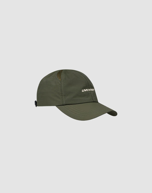 The LFDY Performance Cap by LIVE FAST DIE YOUNG features an olive green color, geometric ventilation holes, visible stitching, and "LIVE2PARTY" embroidered in white on the front, displayed against a light grey background.