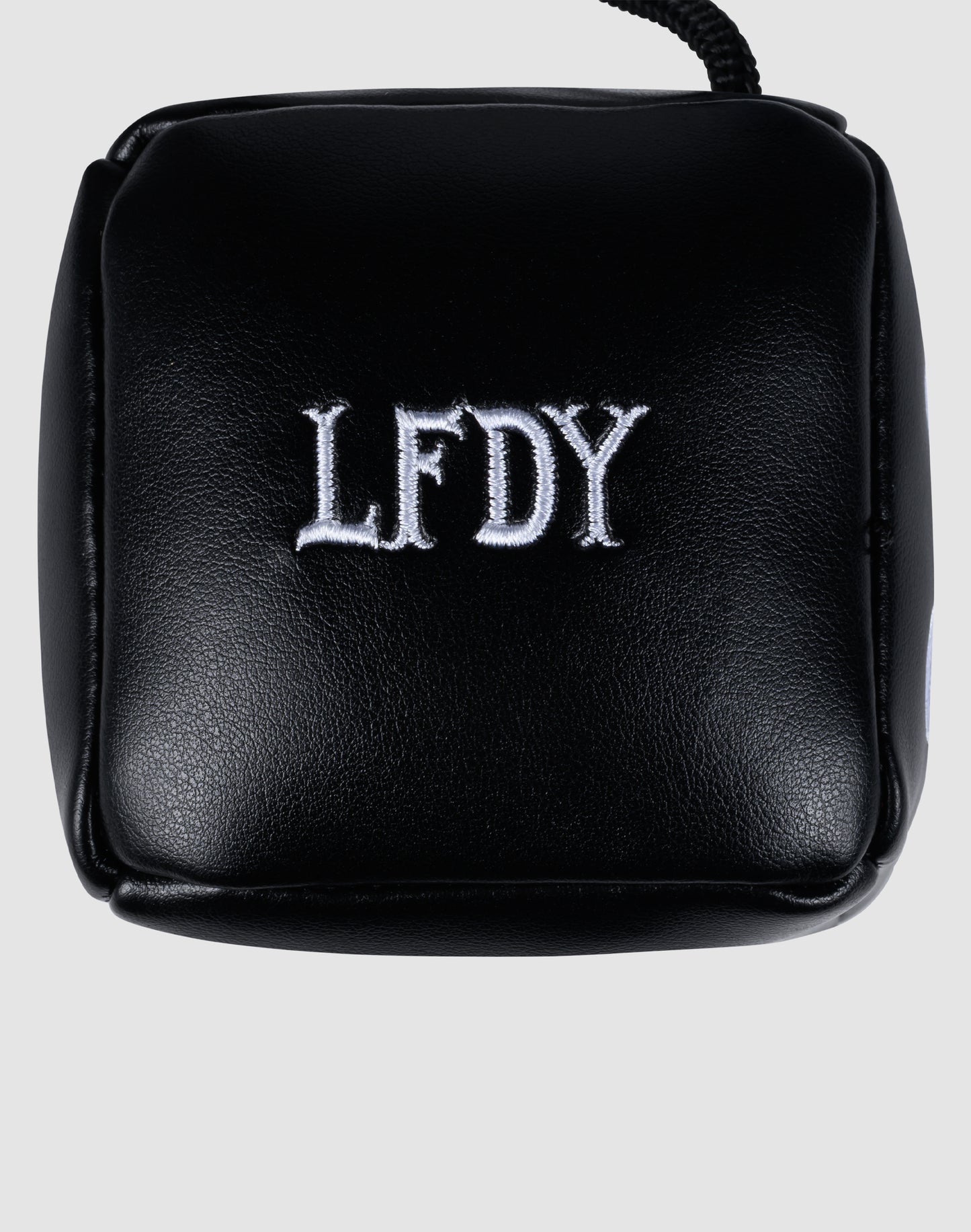 The LFDY Leather Car Dice by LIVE FAST DIE YOUNG features a black PU-leather pouch with white embroidered LFDY letters, displayed on a light gray background.