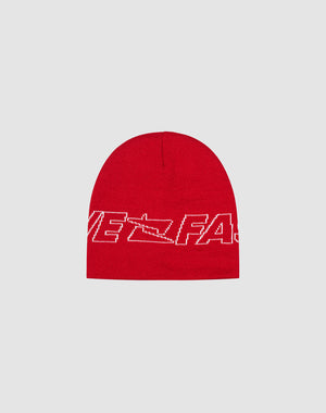 The Live Fast Jacquard Beanie by LIVE FAST DIE YOUNG is a red knit Polyacryl beanie with a white abstract logo and text design, partially reading VE FAS, shown on a light gray background.