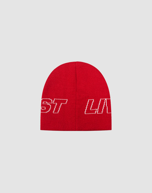 The Live Fast Jacquard Beanie by LIVE FAST DIE YOUNG is a red knit Polyacryl beanie, displaying a white-outlined logo with partially visible ST and LIV, shown on a plain light grey background.