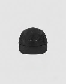 The LIVE FAST DIE YOUNG Live Fast 5 Panel Cap is a black nylon hat with “LIVE FAST” embroidered in white on the front, shown against a plain light gray background.