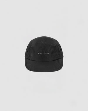 The LIVE FAST DIE YOUNG Live Fast 5 Panel Cap is a black nylon hat with “LIVE FAST” embroidered in white on the front, shown against a plain light gray background.