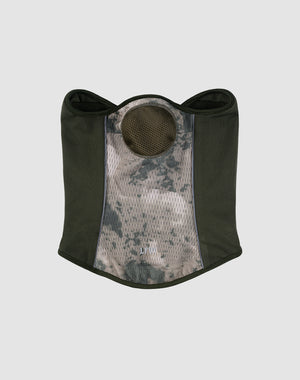 The LFDY Running Mask by LIVE FAST DIE YOUNG is made from 100% polyester with a camouflage pattern, dark green sides, mesh chest fabric, a central circular opening, and reflective piping. Displayed on a light gray background.