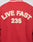 The LFDY OC College Jacket is a red varsity jacket with white trim, Eingrifftaschen, and a bold LIVE FAST Rücken-Stick Frottee-Patch plus the number 235 in large white textured letters on the back.