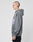 A person with a shaved head stands in profile against a plain white background, wearing the LIVE FAST DIE YOUNG Triple LF Hooded sweatshirt in an oversize fit with a bold frontprint graphic; their arms are relaxed by their side.