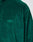 Close-up of the LIVE FAST DIE YOUNG Velvet Halfzip in green, featuring oversize fit and LfdY™ embroidery on the chest. The soft velvet shows part of the shoulder, sleeve, and upper chest.