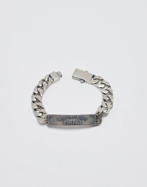 The New World Order Bracelet by LIVE FAST DIE YOUNG is a chunky 925 sterling silver chain with a rectangular engraved plate reading “New York On Time Fast” and a secure clasp, shown on a plain white background.