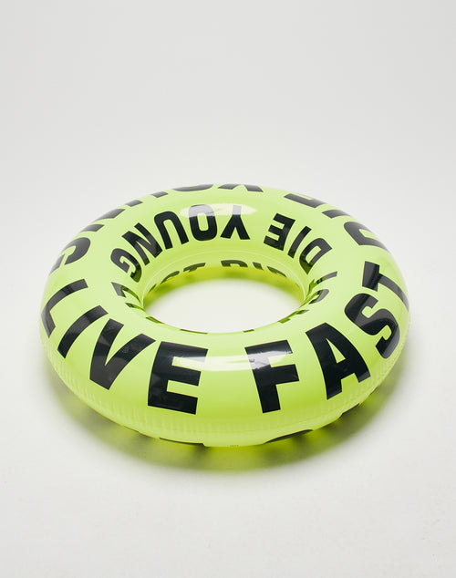The Live Fast Swim Ring by LIVE FAST DIE YOUNG is a neon yellow PVC float with a bold black LIVE FAST DIE YOUNG logo, shown on a plain white background.