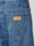 Close-up of the back pocket of LFDY Wide Denim jeans, showing a rectangular tan leather patch embossed with "LFDY." Style LF2103-11721, made from 100% cotton for comfort and durability.