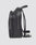 Side view of the LIVE FAST DIE YOUNG LFDY Leather Backpack in black, featuring two zippered compartments, adjustable shoulder straps, and a top handle—ideal for your laptop—shown against a plain white background.