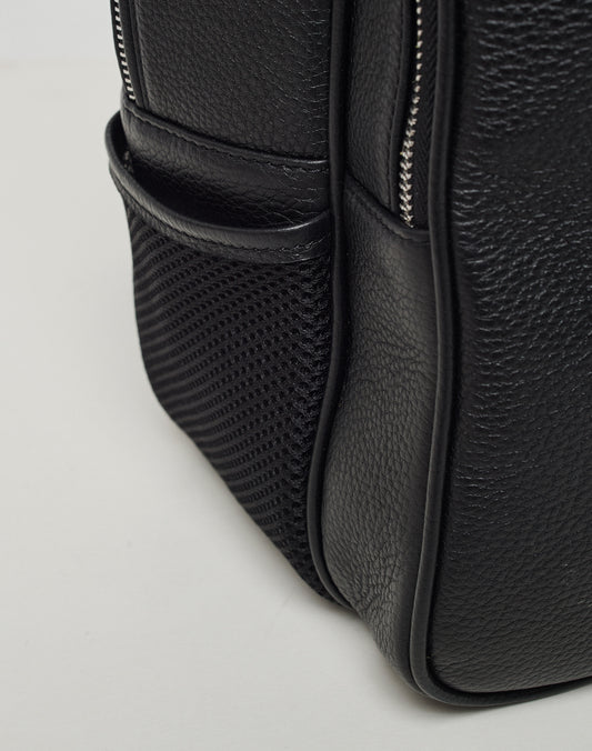 Close-up of the side of the black LFDY Leather Backpack by LIVE FAST DIE YOUNG, featuring a mesh pocket and visible silver zipper—ideal for carrying your laptop—set against a plain light background.