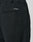 Close-up of LFDY Regular Casual Pants in black with a regular fit, elastic waistband, back and side pockets, and LIVE FAST™ white text above the back pocket.